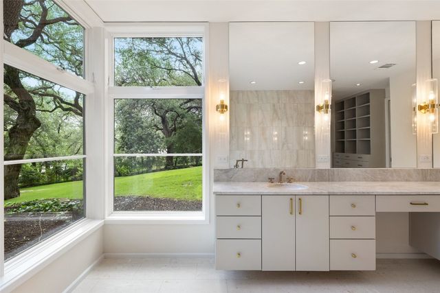 a view of a livingroom with furniture and window