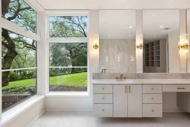 a view of a livingroom with furniture and window