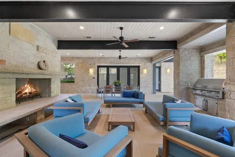 a view of a swimming pool with a patio