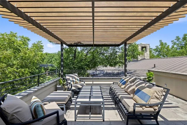 a view of a living room and floor to ceiling window