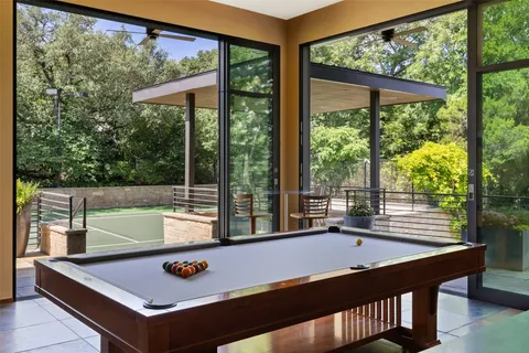 a backyard of a house with lots of green space