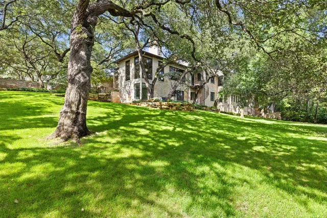 a view of a house with a swimming pool
