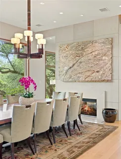 a kitchen with stainless steel appliances granite countertop counter space a sink and a large window
