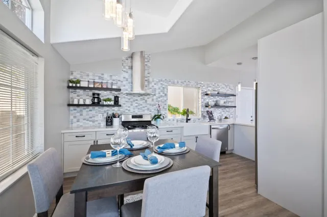 a view of a dining room with furniture window and outside view