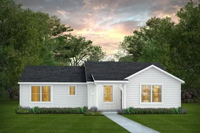 a view of a house with a yard