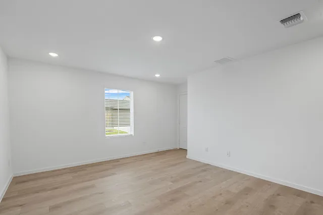 a view of kitchen with wooden floor