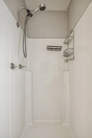 a view of a room with racks on the wall