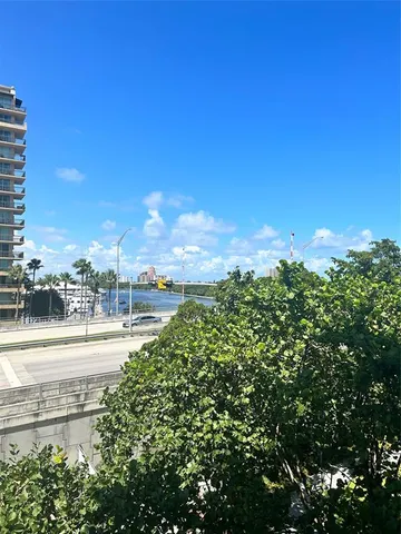 a view of a city street from a building