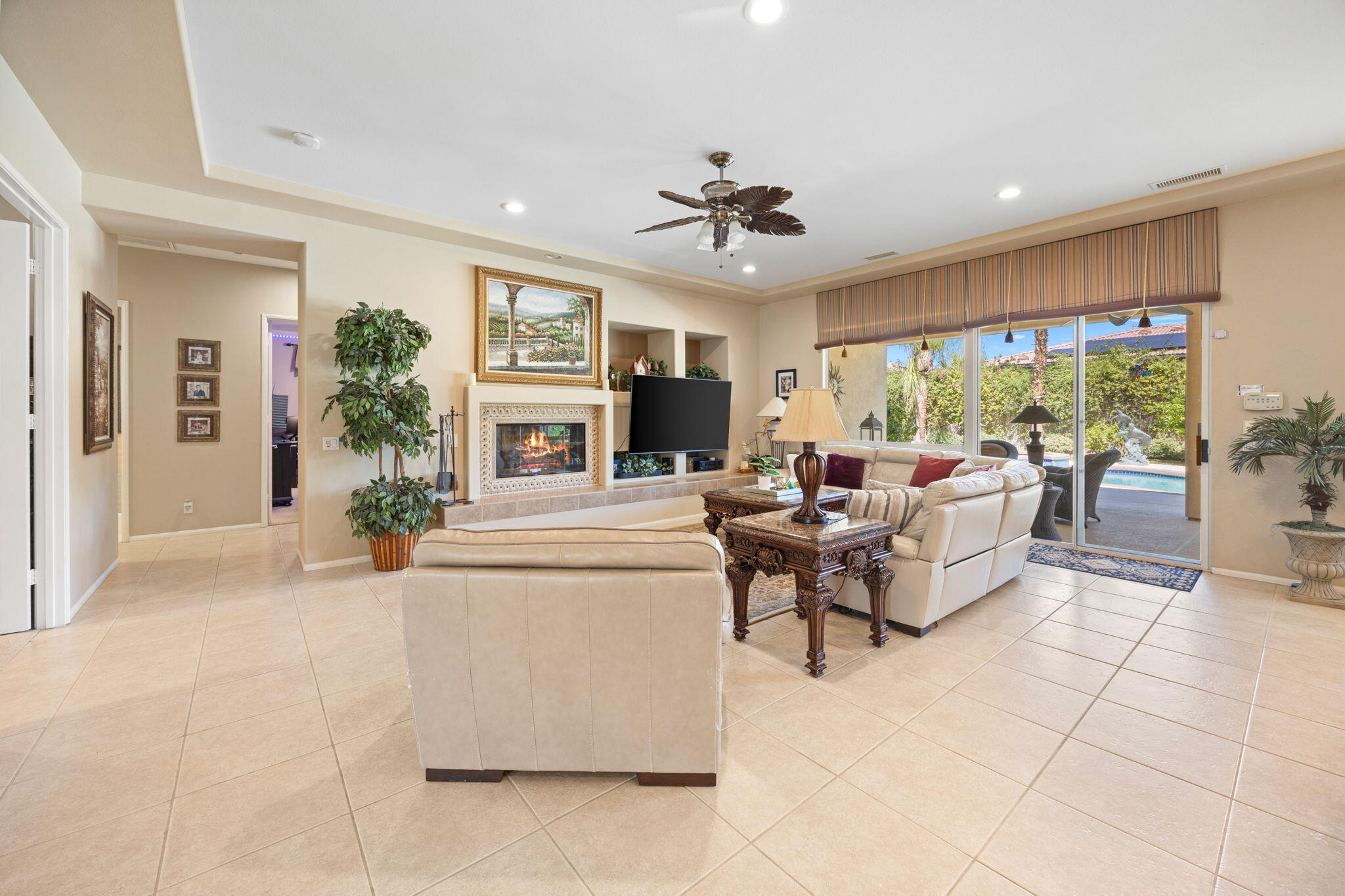 74068 Kokopelli Circle Palm Desert, CA 92211 - Photo 12 of 46 a living room with furniture and a large window