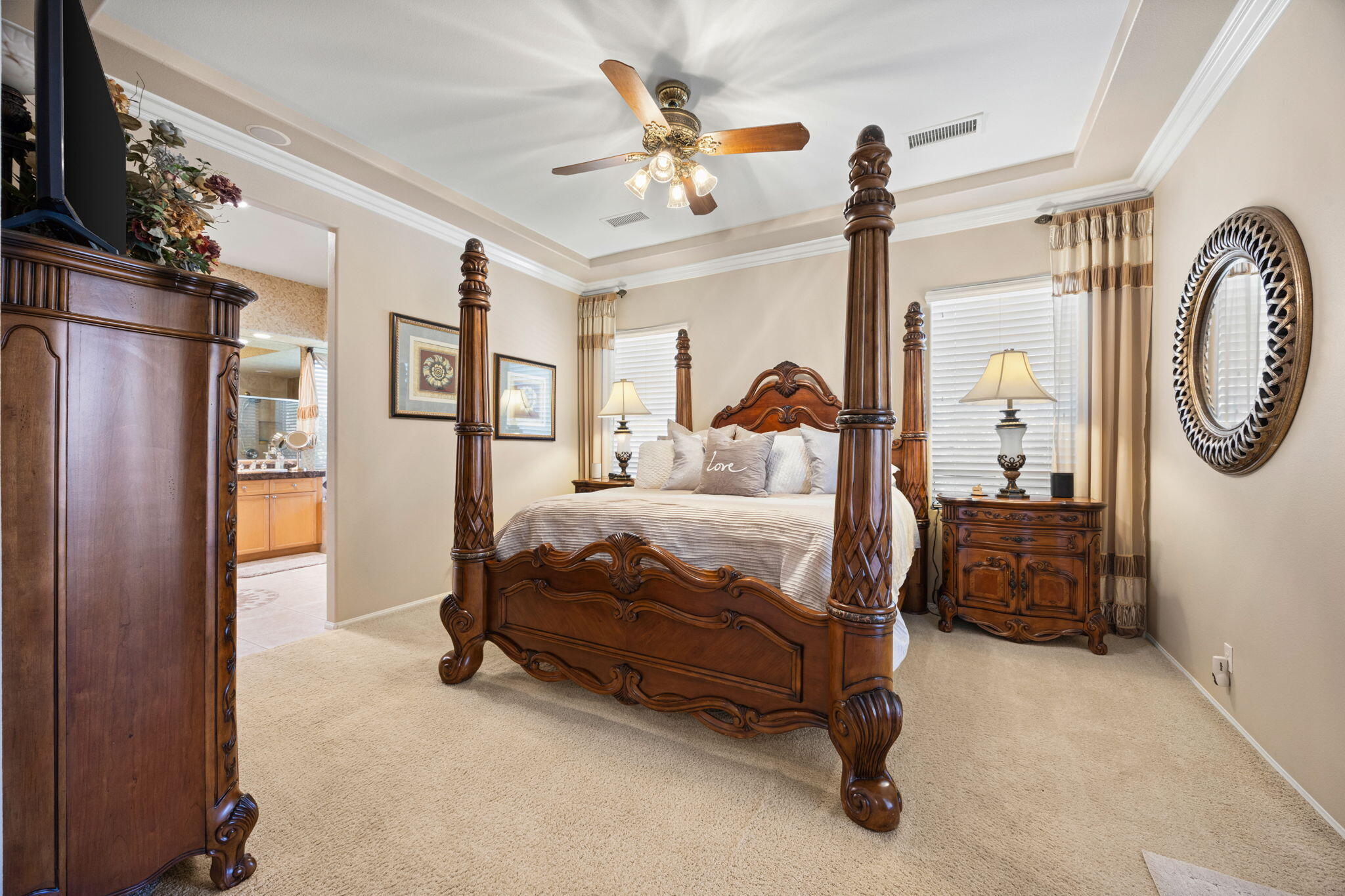 74068 Kokopelli Circle Palm Desert, CA 92211 - Photo 19 of 46 a bedroom with a bed a mirror and a closet