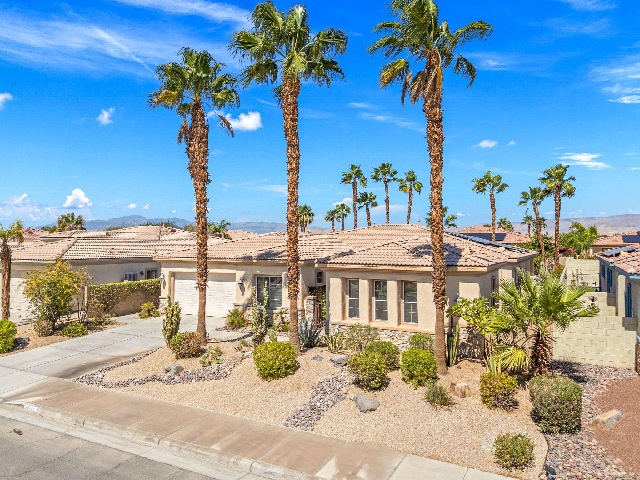 74068 Kokopelli Circle Palm Desert, CA 92211 - Photo 2 of 46 a view of a house with a patio
