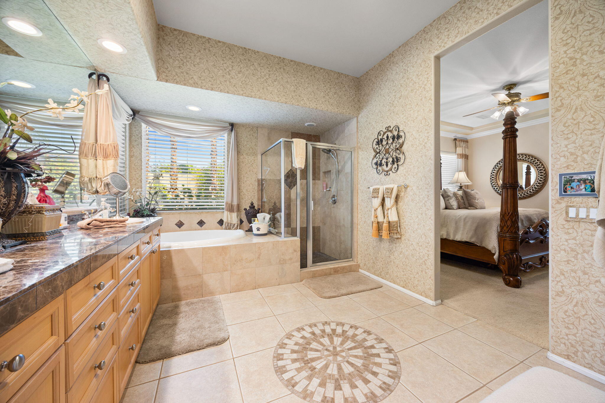 74068 Kokopelli Circle Palm Desert, CA 92211 - Photo 24 of 46 a large spacious bathroom with a tub and shower
