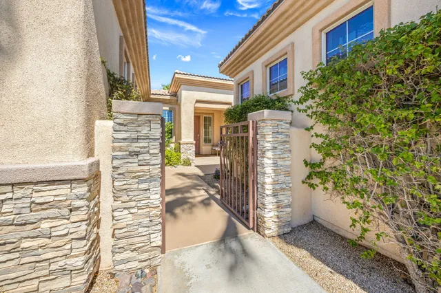 a view of a brick building with many windows