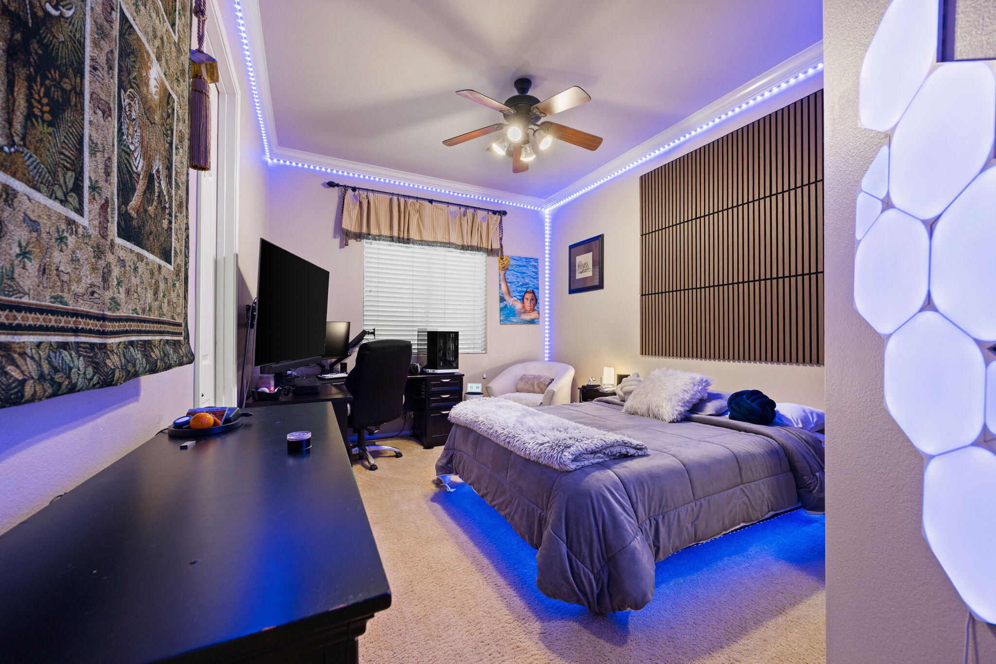 74068 Kokopelli Circle Palm Desert, CA 92211 - Photo 31 of 46 a bedroom with bed and a chandelier