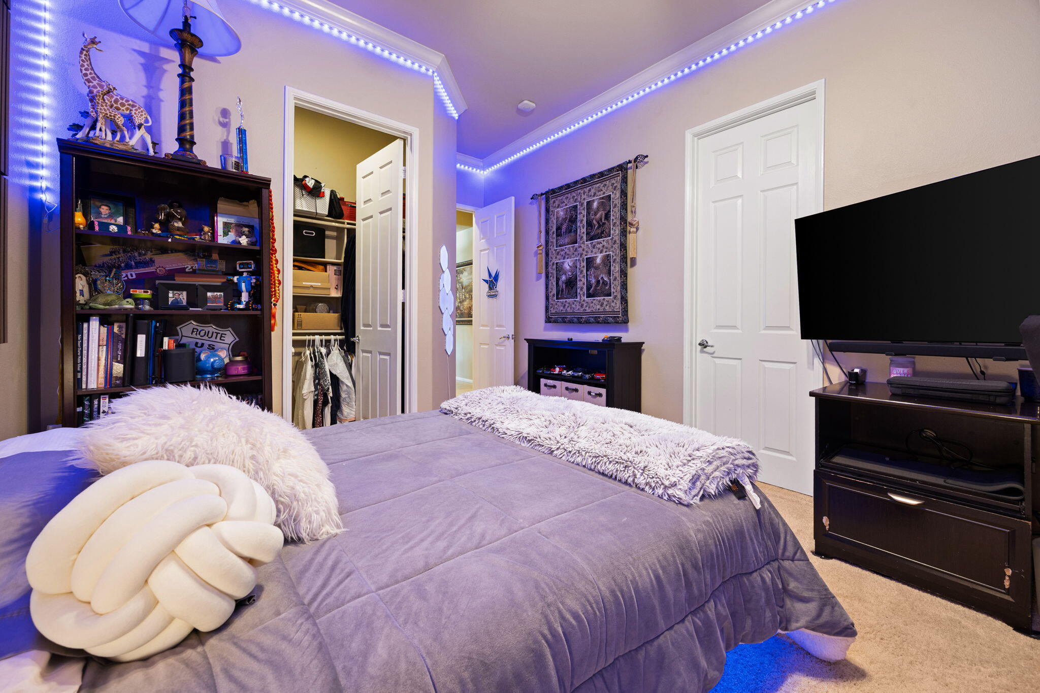 74068 Kokopelli Circle Palm Desert, CA 92211 - Photo 32 of 46 a bedroom with a bed and a television