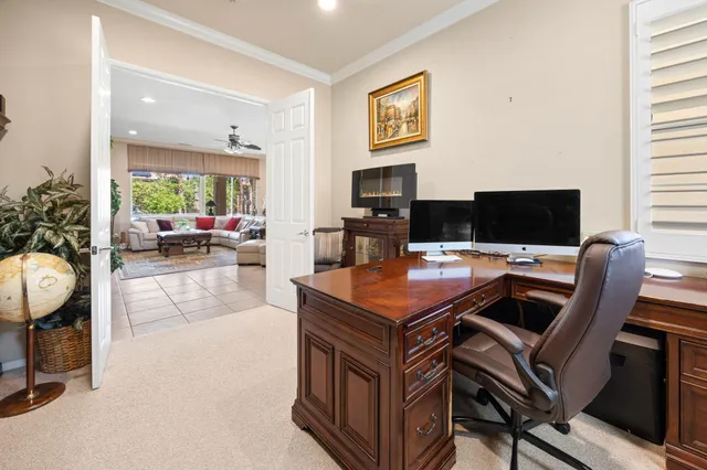 a view of a workspace with furniture