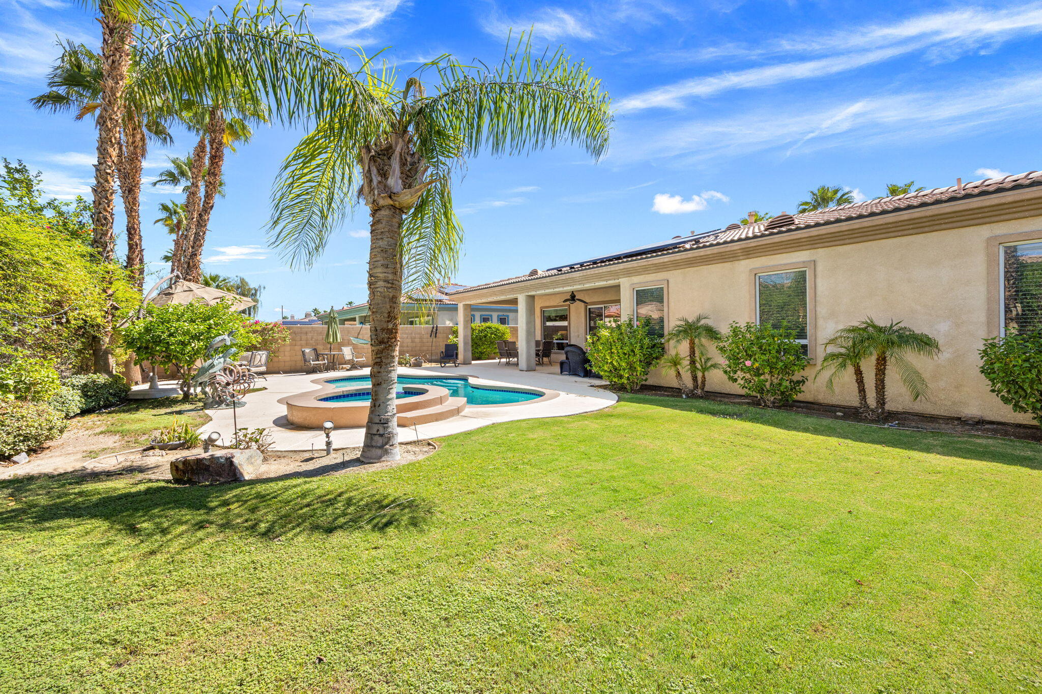 74068 Kokopelli Circle Palm Desert, CA 92211 - Photo 42 of 46 a swimming pool with outdoor seating and yard