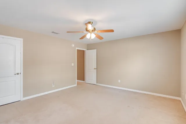 an empty room with a bench