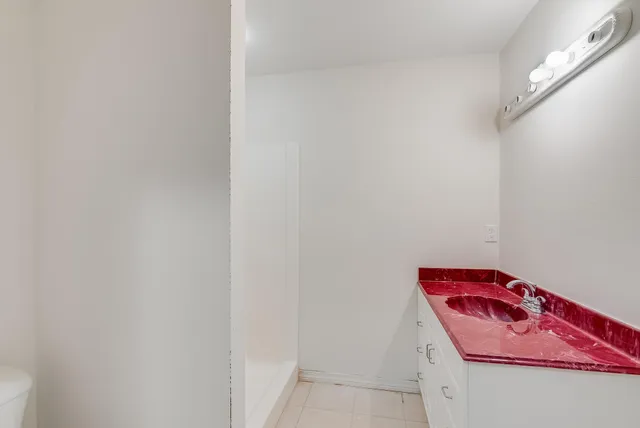 a view of a swimming pool with lounge chair