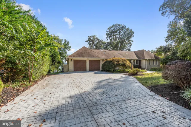 a view of a house with a big yard