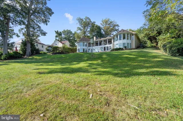 a front view of a house with a boat