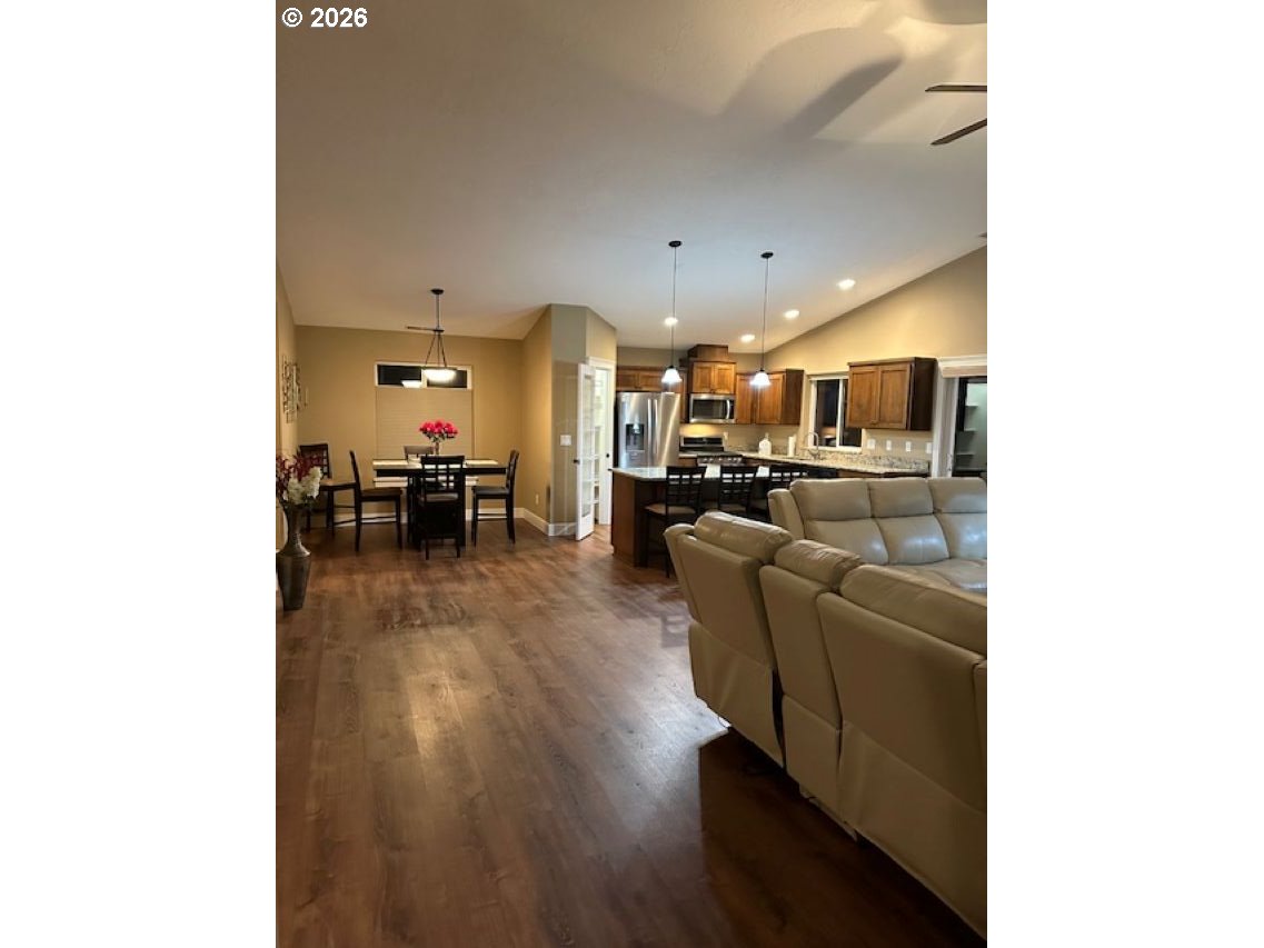 2072 Equestrian Loop South Salem, OR 97302 - Photo 3 of 4 a living room with furniture and kitchen view