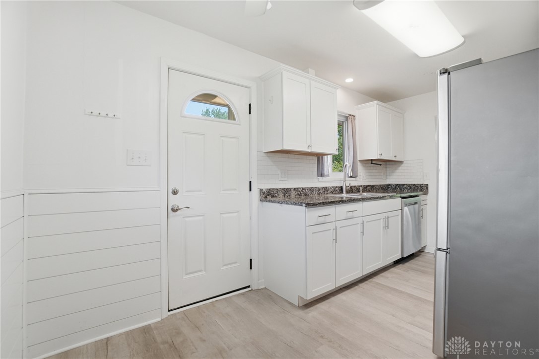 629 Storms Road Dayton, OH 45429 - Photo 26 of 51 This bright kitchen features durable flooring and sleek appliances, perfect for everyday living.