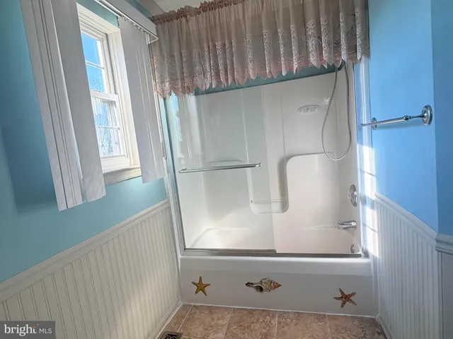 a bathroom with a bathtub