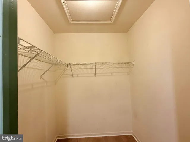 a view of a room with racks on the wall