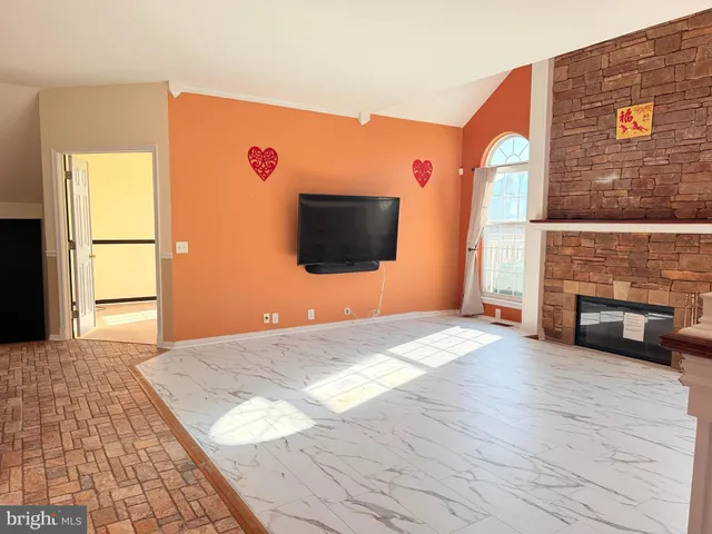 a view of livingroom with furniture and fireplace