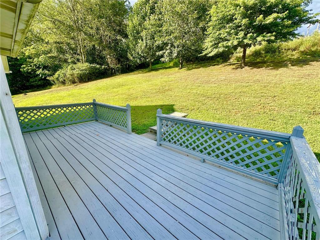 143 Raineytown Road Dawson, PA 15428 - Photo 20 of 42 a view of a hardwood deck