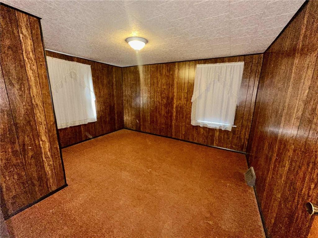 143 Raineytown Road Dawson, PA 15428 - Photo 30 of 42 a view of an empty room with a window