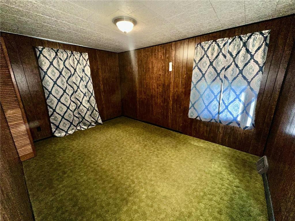 143 Raineytown Road Dawson, PA 15428 - Photo 32 of 42 a view of an empty room with a window