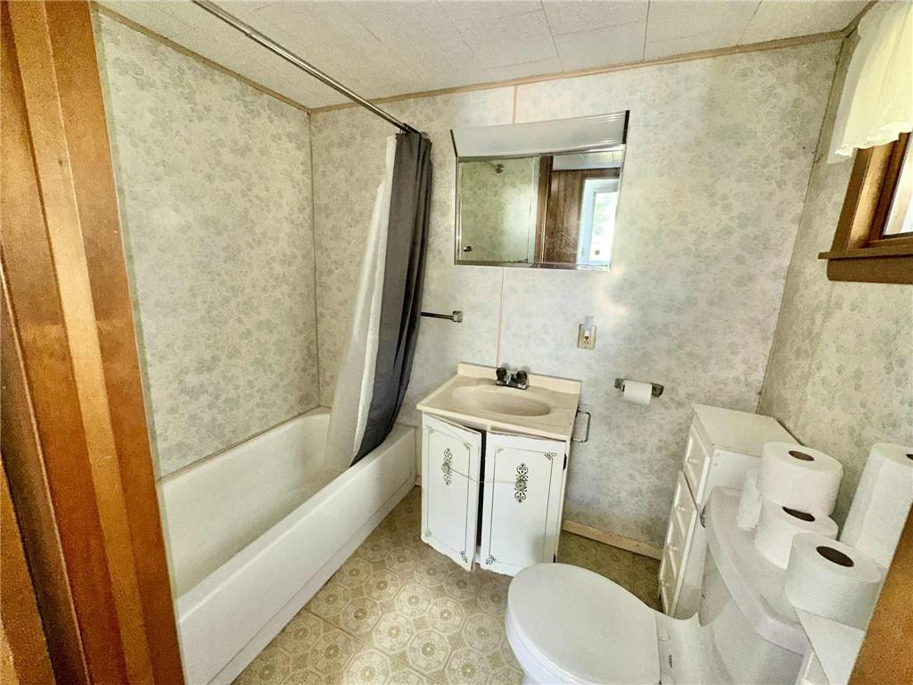 143 Raineytown Road Dawson, PA 15428 - Photo 37 of 42 a bathroom with a sink toilet and shower