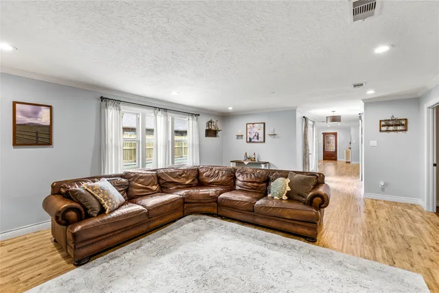 a living room with furniture and a couch
