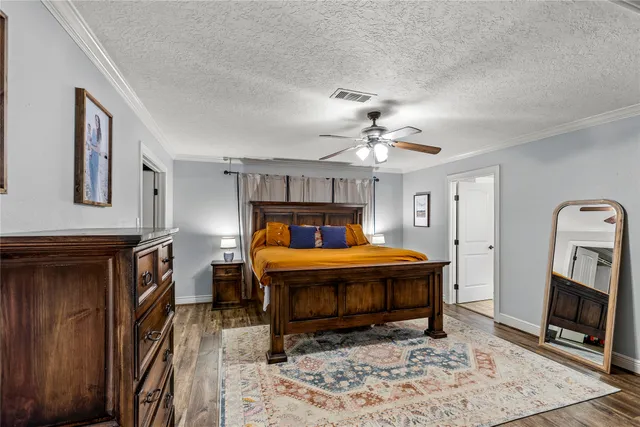 a bed room with a bed and a fireplace