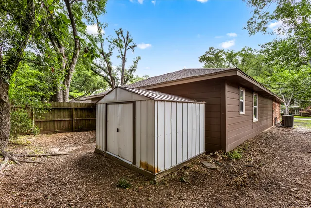 a backyard of a house with lots of green space