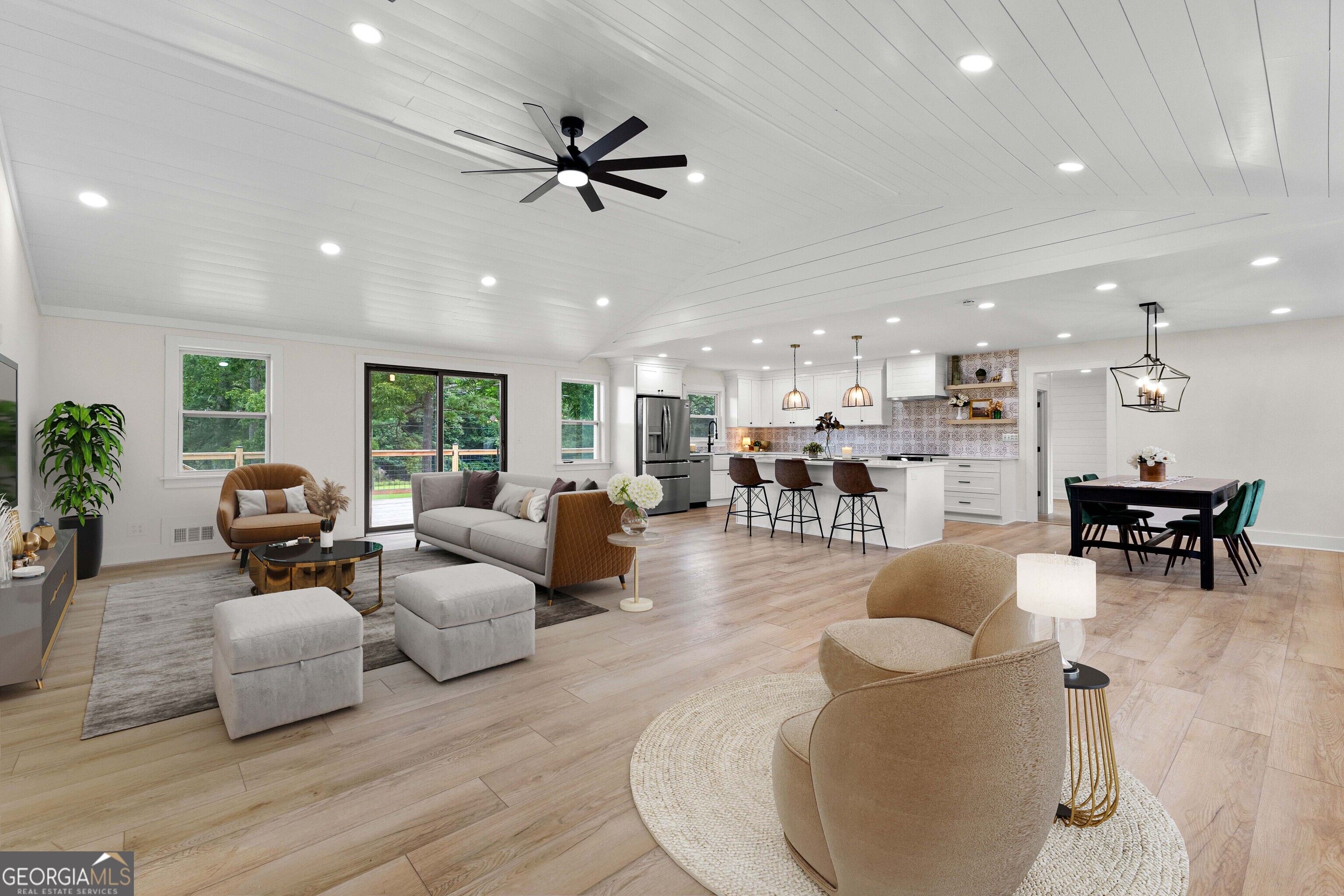 1367 Sharpsburg McCollum Road Sharpsburg, GA 30277 - Photo 11 of 80 a living room with furniture and kitchen view