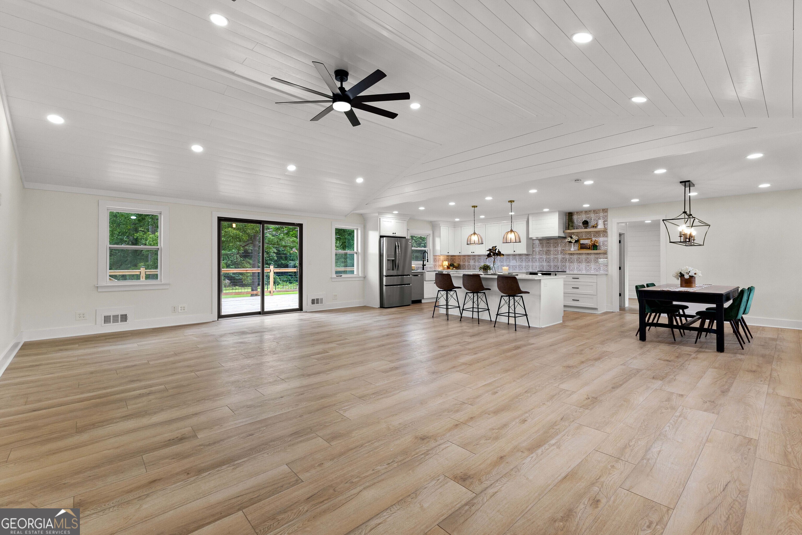 1367 Sharpsburg McCollum Road Sharpsburg, GA 30277 - Photo 18 of 80 a view of a kitchen with a sink and a stove top oven