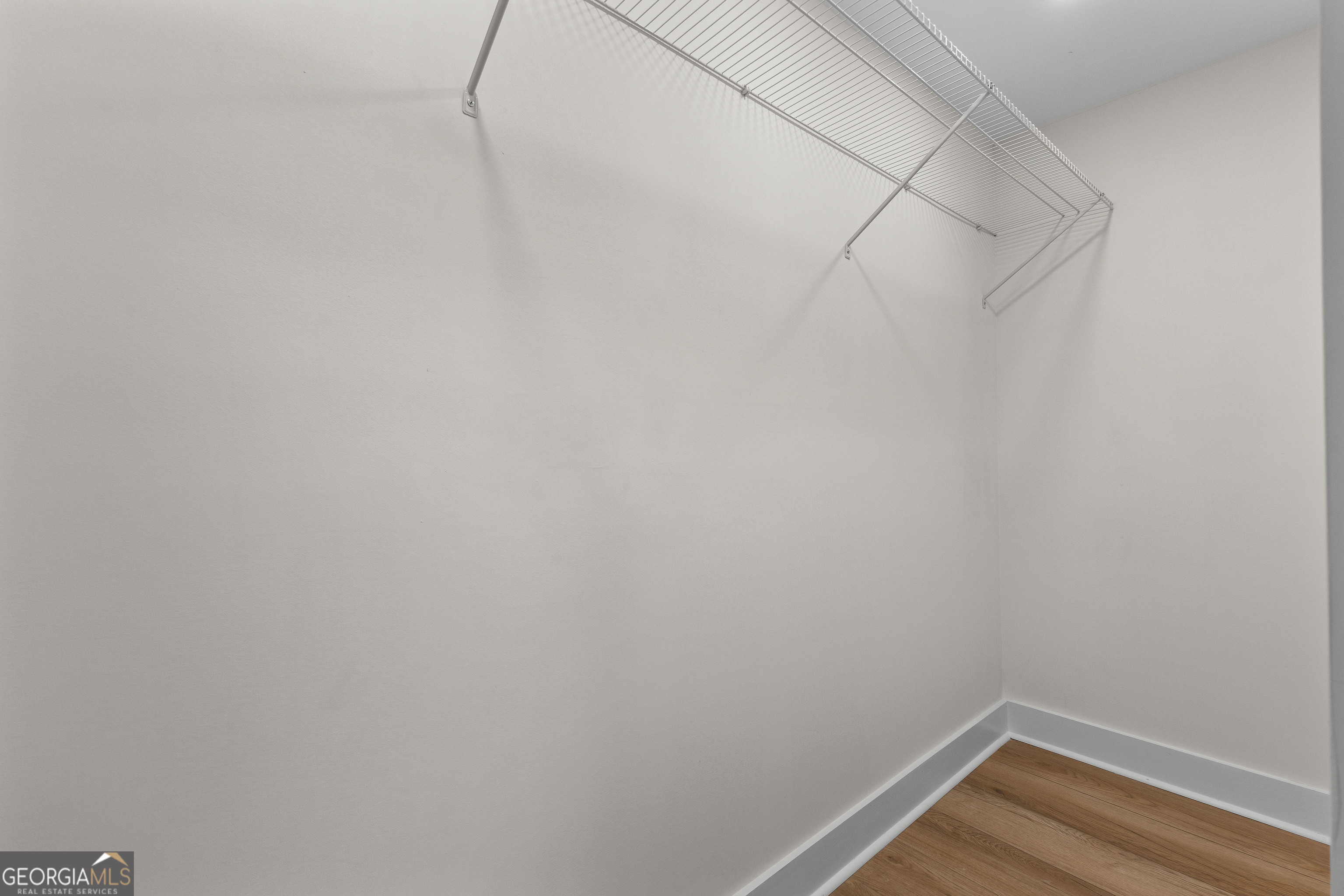 1367 Sharpsburg McCollum Road Sharpsburg, GA 30277 - Photo 41 of 80 a view of a room with racks on the wall