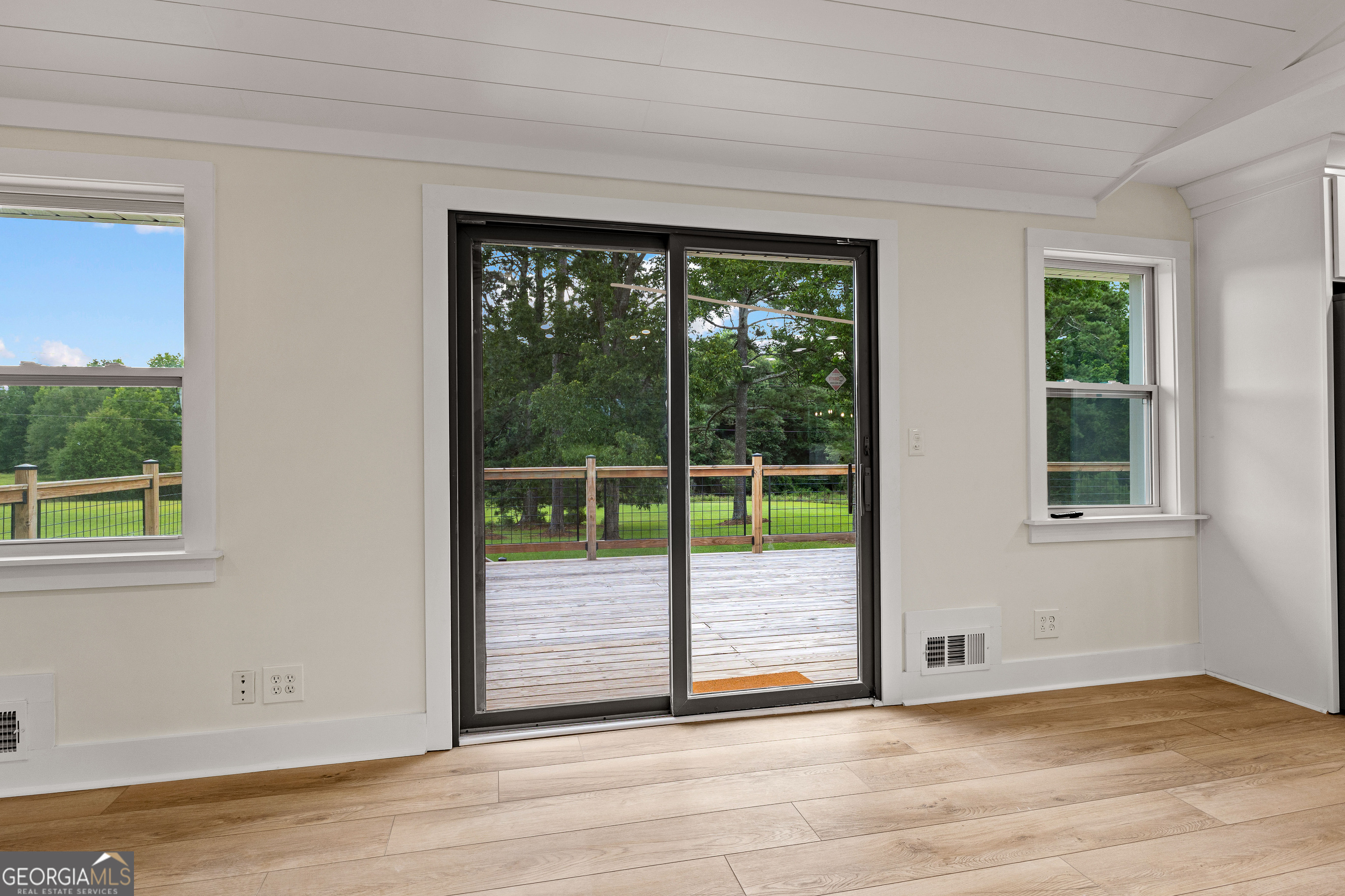 1367 Sharpsburg McCollum Road Sharpsburg, GA 30277 - Photo 57 of 80 a view of a room with wooden floor and a window