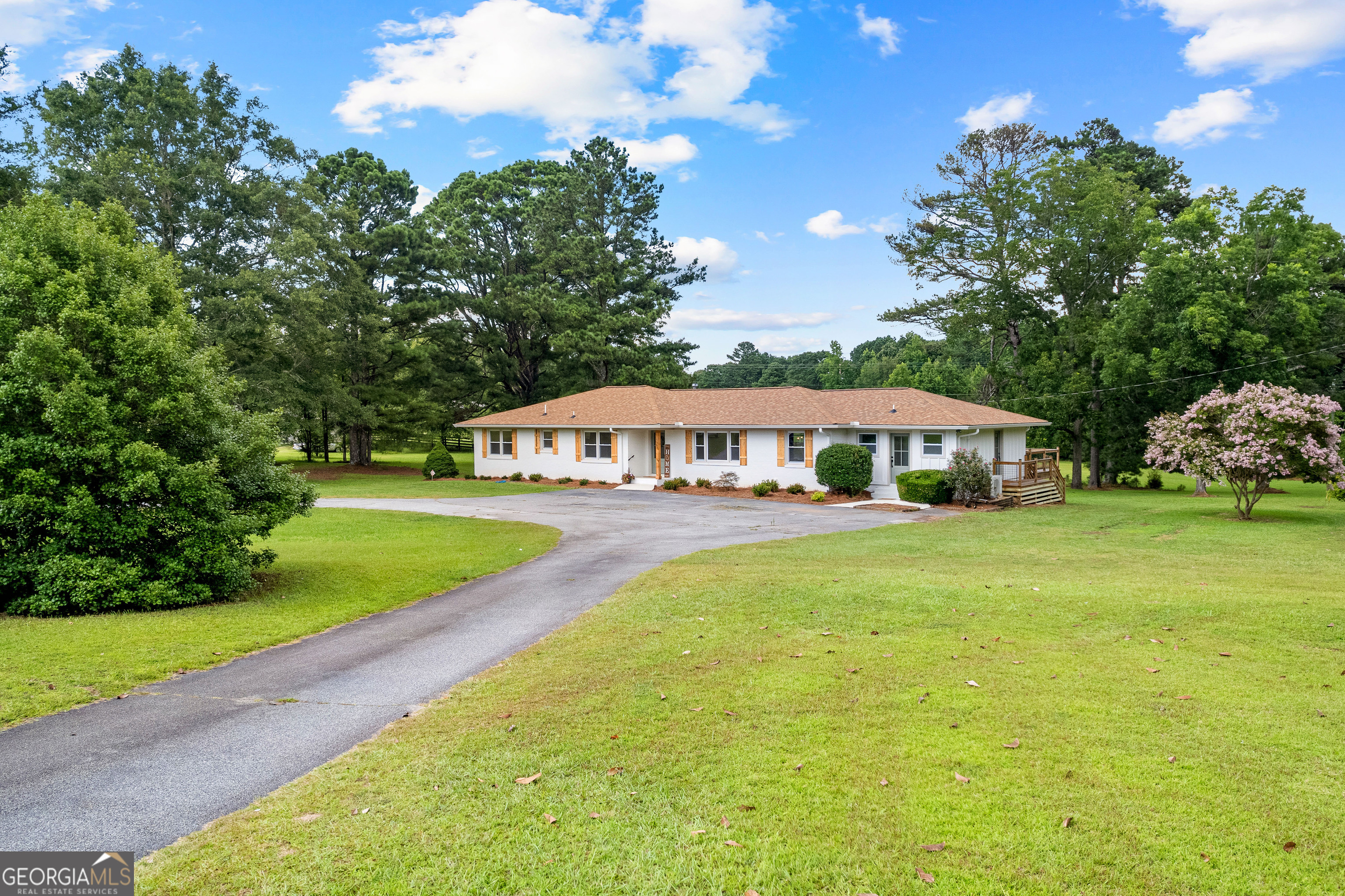 1367 Sharpsburg McCollum Road Sharpsburg, GA 30277 - Photo 6 of 80 a view of a house with swimming pool and yard