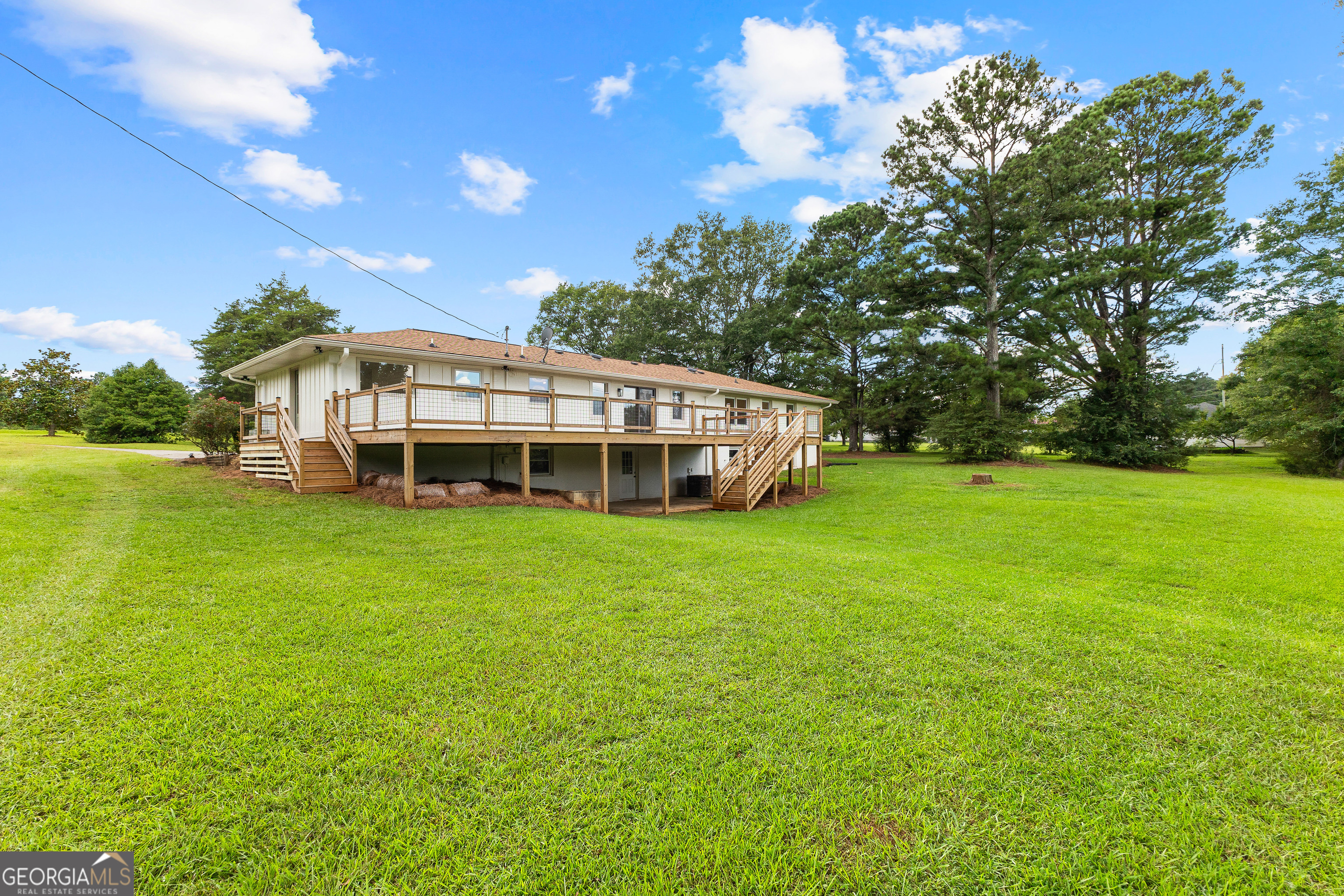1367 Sharpsburg McCollum Road Sharpsburg, GA 30277 - Photo 61 of 80 a view of a house with a big yard