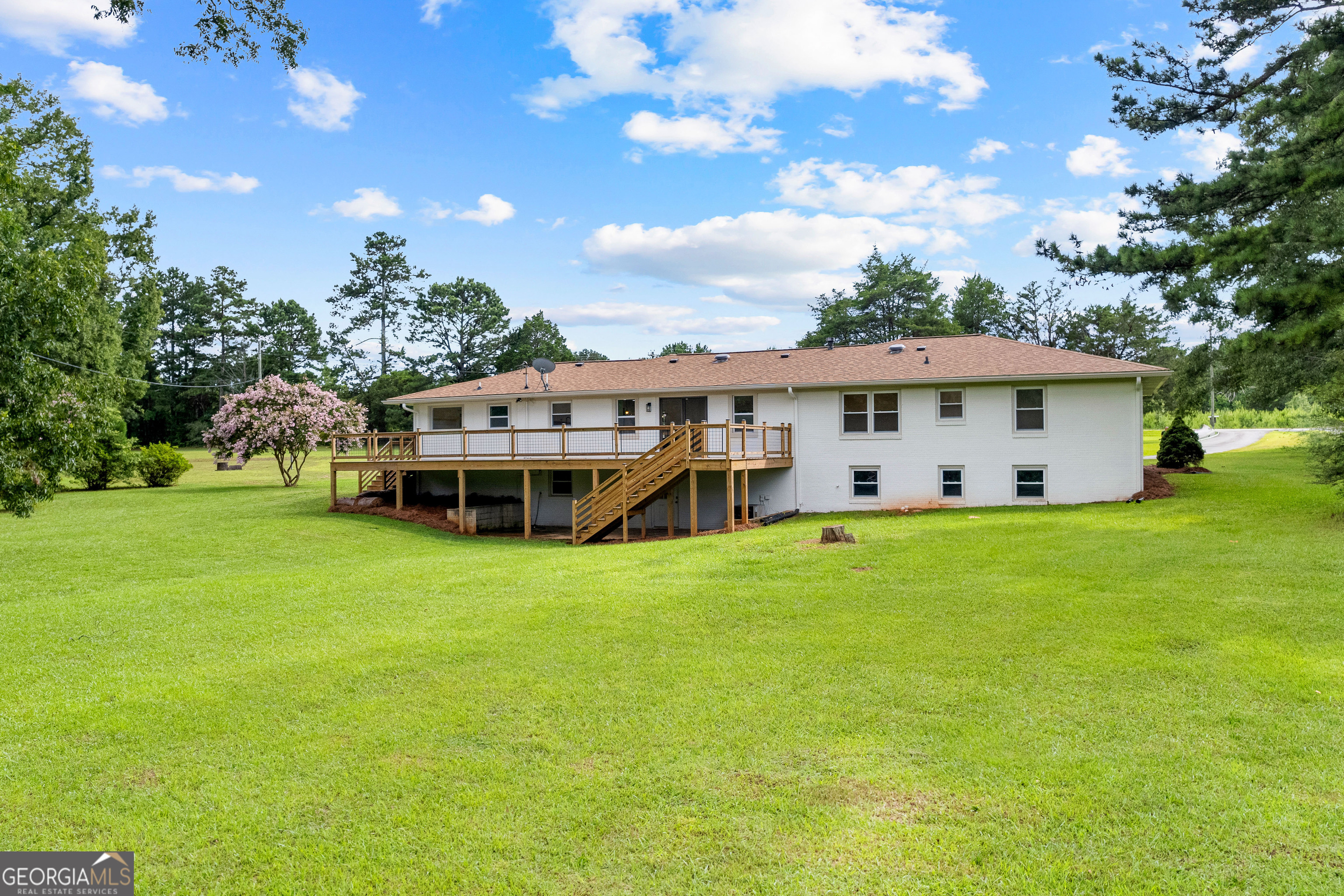 1367 Sharpsburg McCollum Road Sharpsburg, GA 30277 - Photo 63 of 80 a view of a house with a big yard