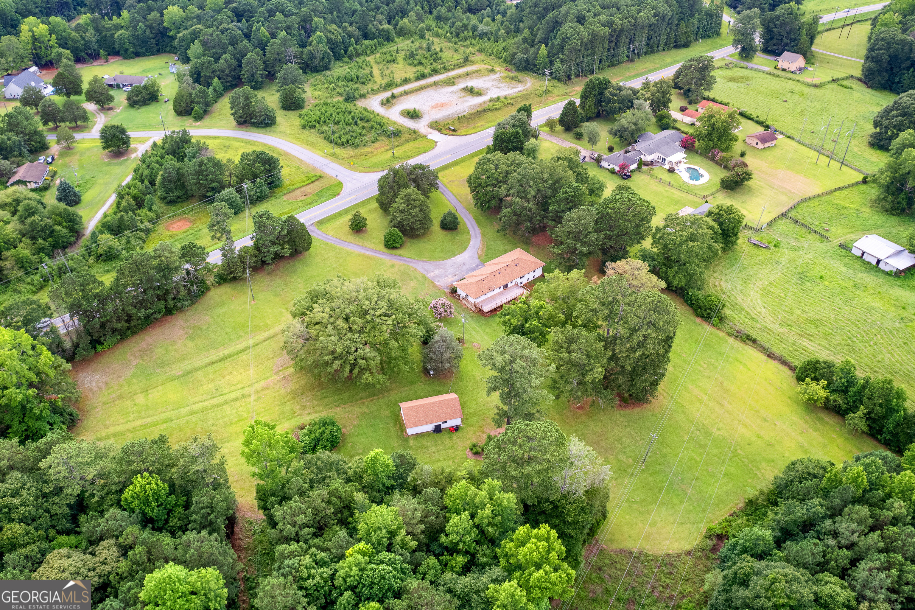 1367 Sharpsburg McCollum Road Sharpsburg, GA 30277 - Photo 66 of 80 an aerial view of residential house with outdoor space and trees all around