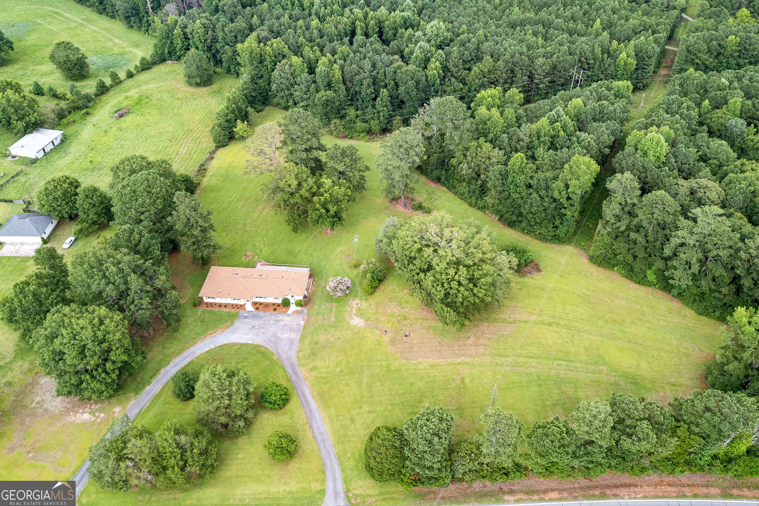 1367 Sharpsburg McCollum Road Sharpsburg, GA 30277 - Photo 68 of 80 an aerial view of residential house with outdoor space and trees all around