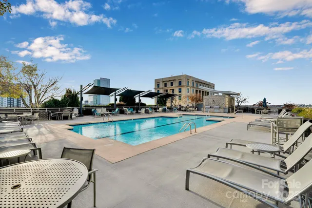 a view of a patio with swimming pool