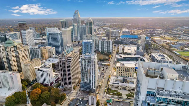 a view of a city with tall buildings