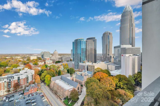a city view with tall buildings