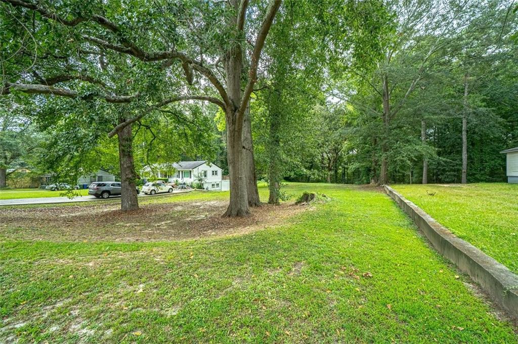 691 Gary Road Northwest Atlanta, GA 30318 - Photo 6 of 8 a view of a park with large trees